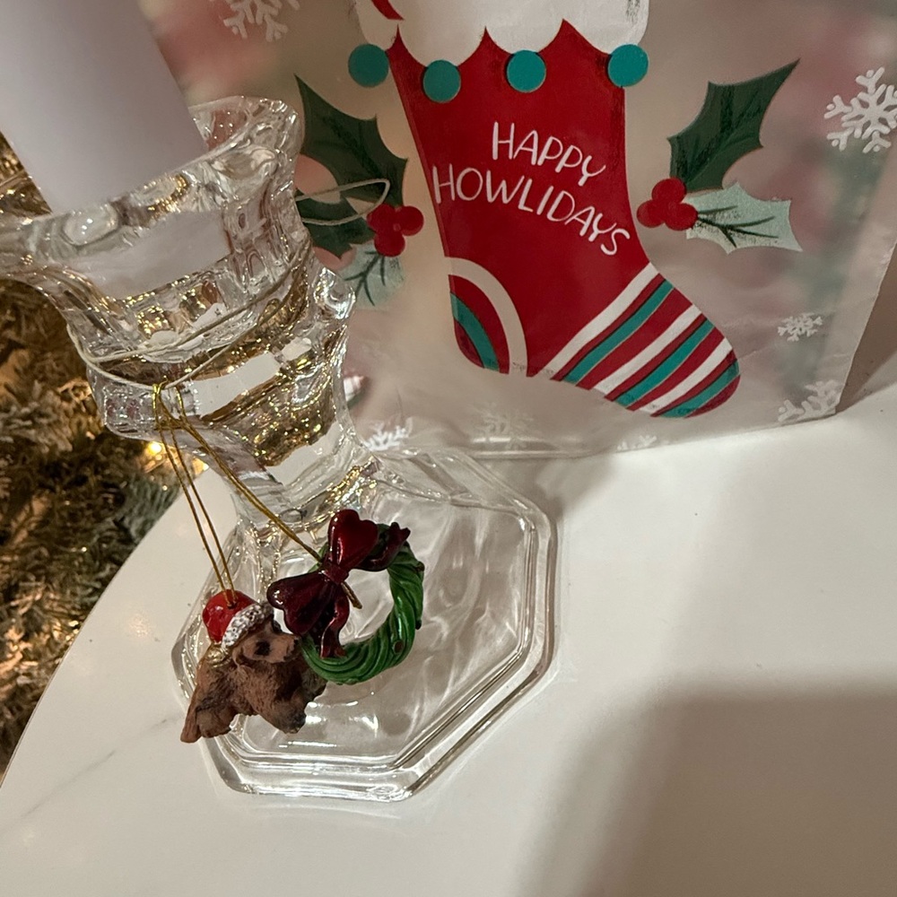 Christmas candle holders includes ornaments, and a gift bag